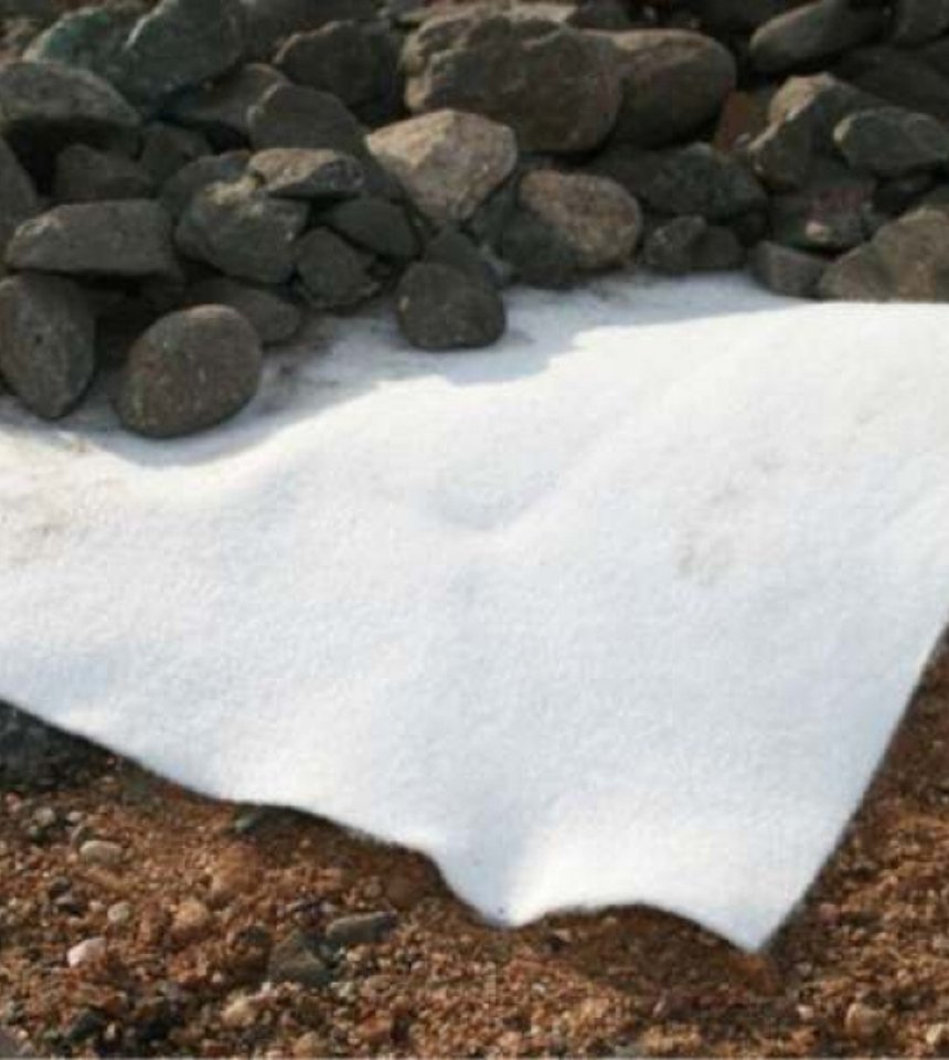 Polyester nonwoven needle punched geotextile fabric installed for soil separation and drainage in road construction